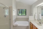 Separate tub and shower in master bathroom